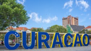 Bright Curaçao letters nearby Plasa Bieu, featuring local food stalls and authentic cuisine
