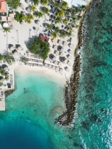 Jan Thiel Beach in Curaçao, a stunning destination with turquoise waters, soft sandy shores, and a vibrant atmosphere.
