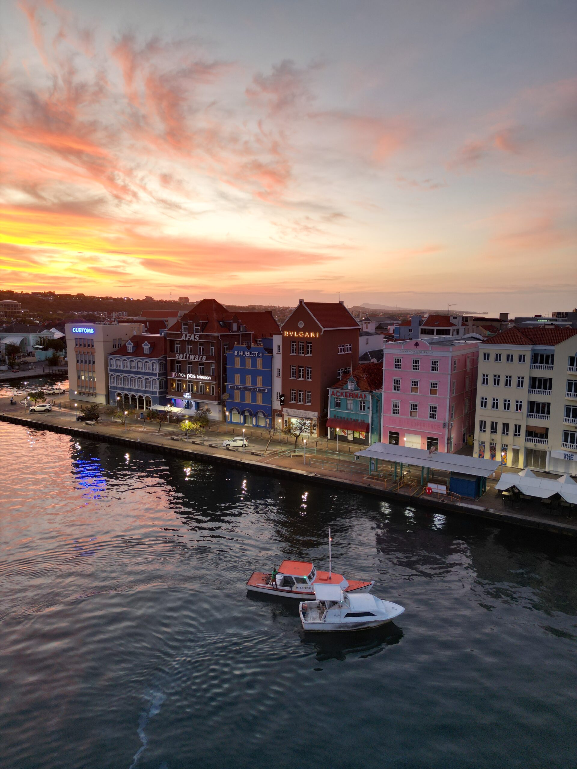 A guided tour through Willemstad, Curaçao, showcasing its colorful Dutch colonial architecture, lively streets, and historical landmarks.