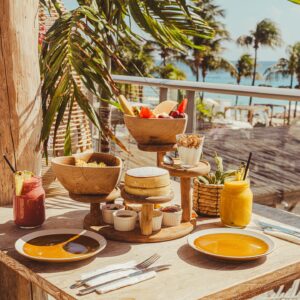 Delicious breakfast spread at a café in Curaçao with tropical surroundings