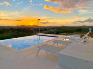 Spacious family villa in Curaçao with large pool, terrace, and green surroundings