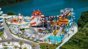 Family enjoying the pool and waterpark at Mangrove Beach Corendon Resort Curaçao